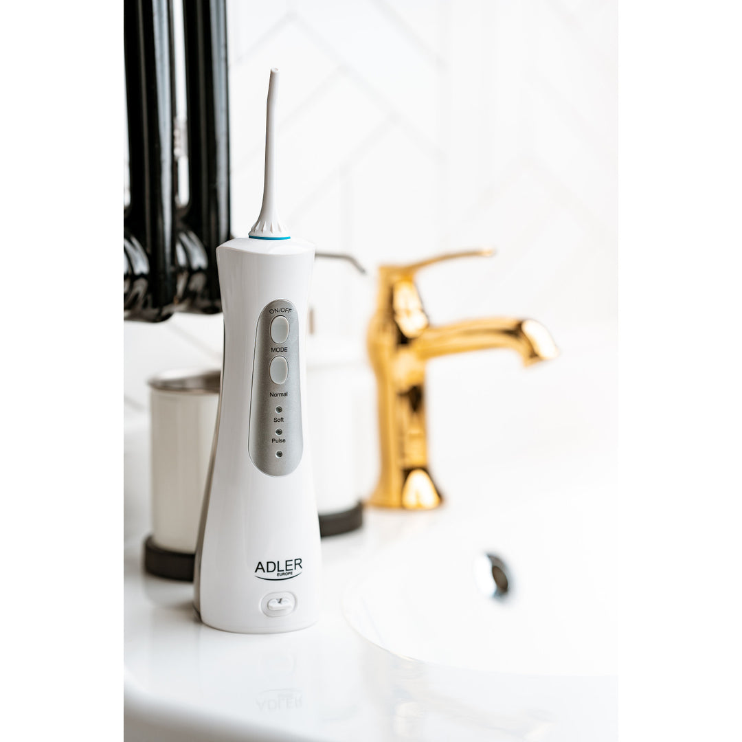Irrigador de viagem Adler AD 2176 e 2 cabeças rotativas intercambiáveis