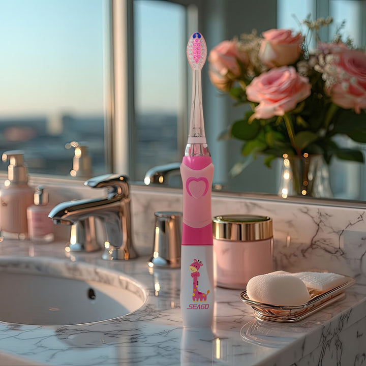 SEAGO Cepillo Dental Sónico Infantil, Color Rosa, 1xAA 1,5V (no incluido), 3 Puntas de Repuesto, SG-977 Rosa