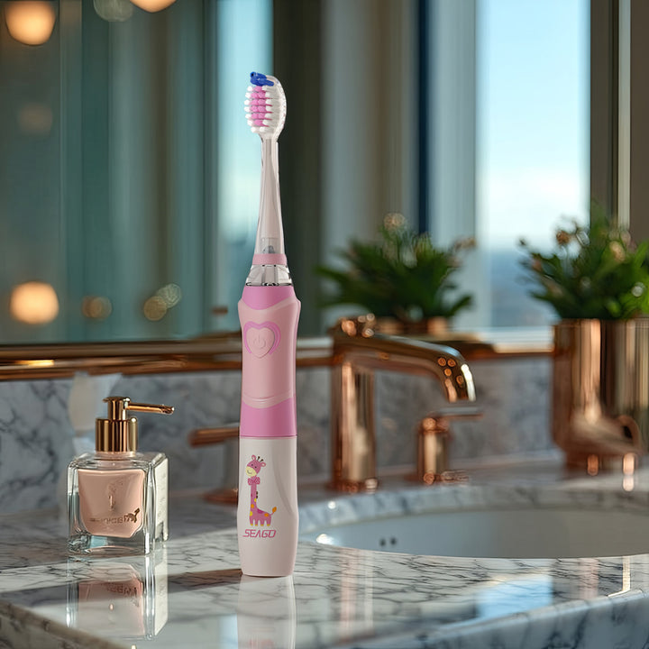 SEAGO Cepillo Dental Sónico Infantil, Color Rosa, 1xAA 1,5V (no incluido), 3 Puntas de Repuesto, SG-977 Rosa