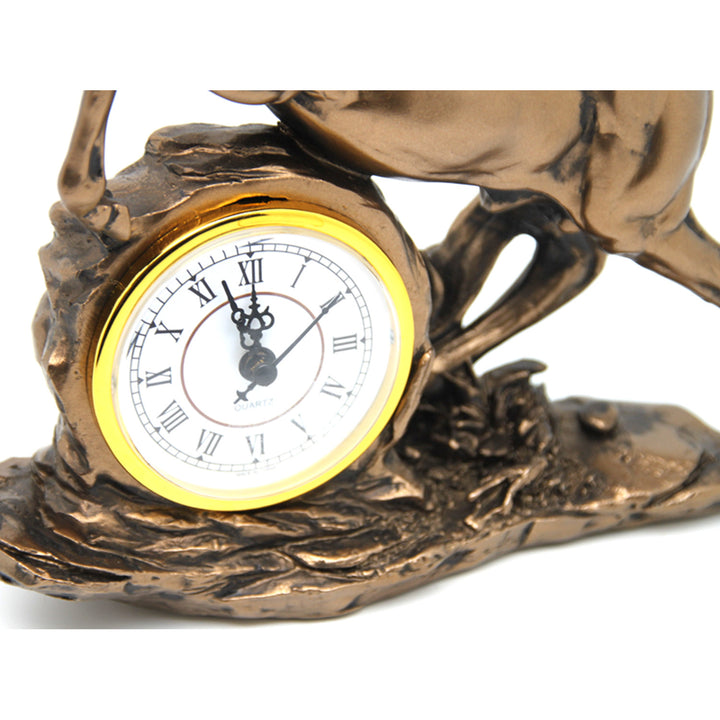 Estatuilla caballo saltando, reloj, decoración bronce, Reina Isabel