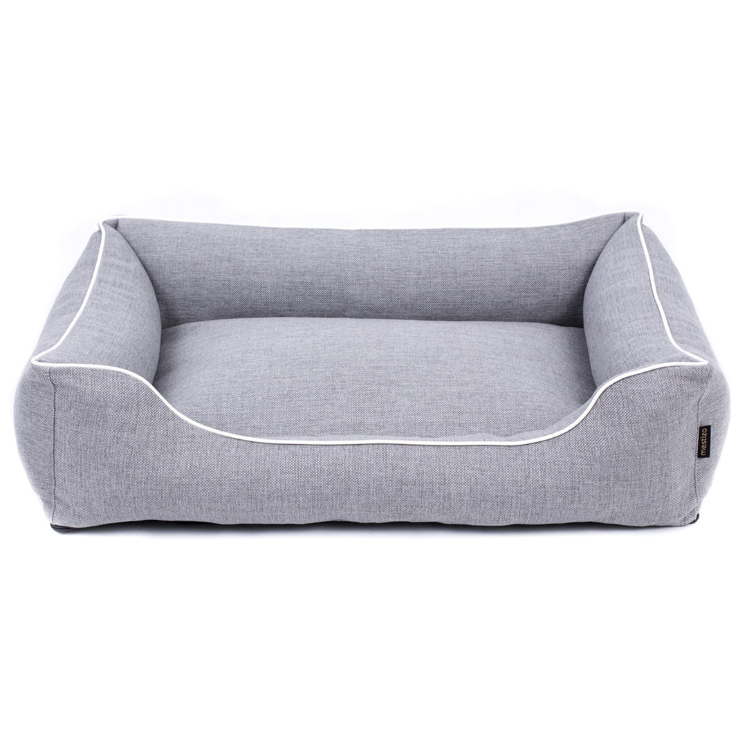 Sofá Mallorca Comfort cama para perro en gris claro con ribete blanco 65x50 cm