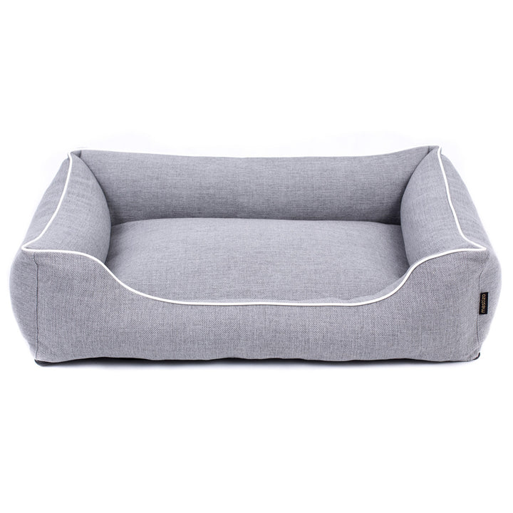 Sofá Mallorca Comfort cama para perro en gris claro con ribete blanco 65x50 cm