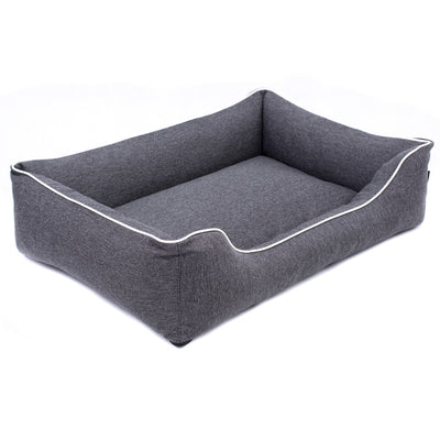 Sofá Mallorca Comfort cama para perro en gris oscuro con ribete blanco 80x60 cm