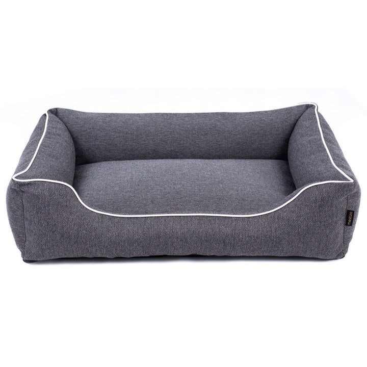 Sofá Mallorca Comfort cama para perro en gris oscuro con ribete blanco 80x60 cm